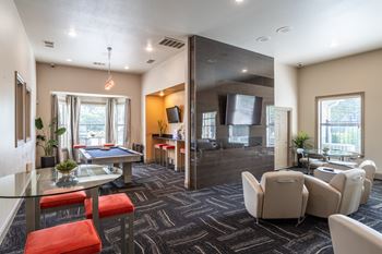 Modern living room with glass table at Grand Villas at Cinco Ranch, Katy, TX